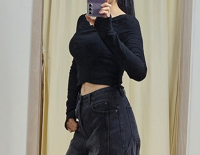 After tummy tuck of DaonC in Korea—black crop top and high-waist pants, defined waist and flat stomach.