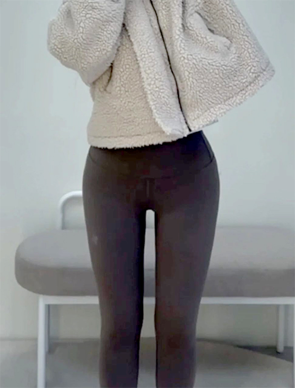After thigh liposuction and buttocks fat transfer of Hari in Korea—front view in leggings, legs appear slim with defined inner gap.