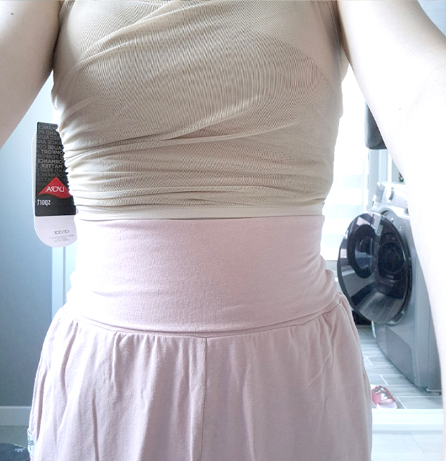After tummy tuck of Jingjingssi in Korea—light pink skirt reveals slim waist and no visible sagging.