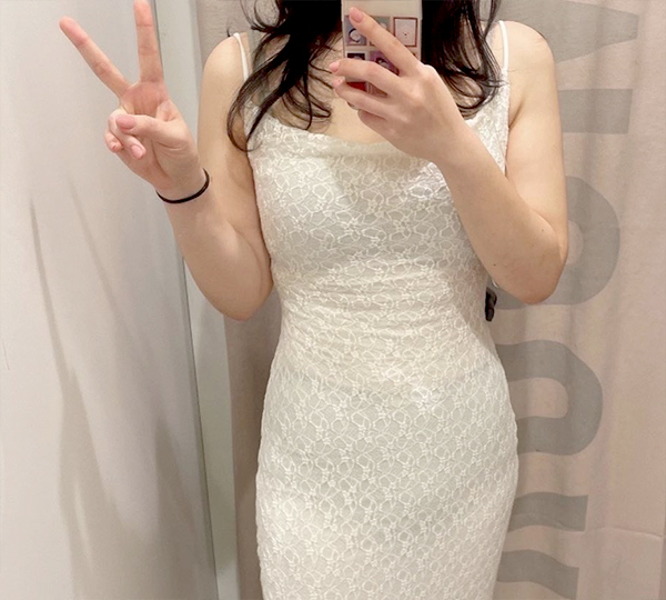 After photo of Yeonikkot in a tight dress showing defined waistline after liposuction in Korea.
